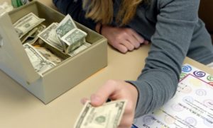 Cashier with cashbox
