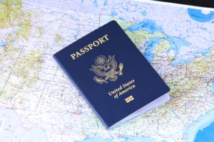 US Passport lying on a US map
