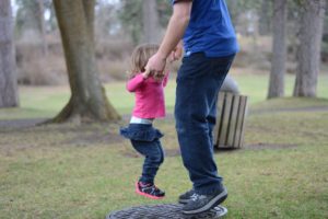 Dad and Daughter jumping